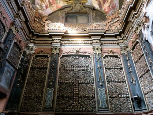 The bone chapel of Milan, where the walls are decorated with the bones of plague victims.